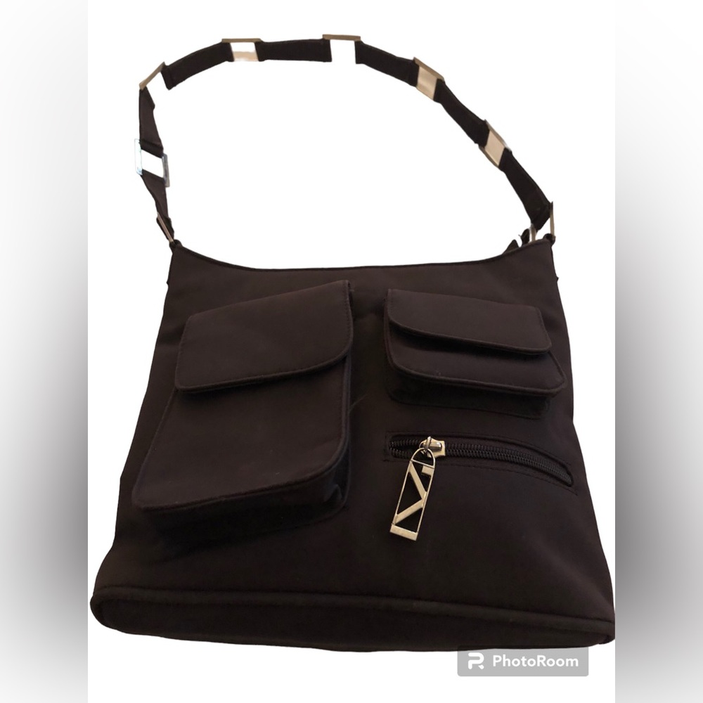 Brown Handbag with Metal Accents.